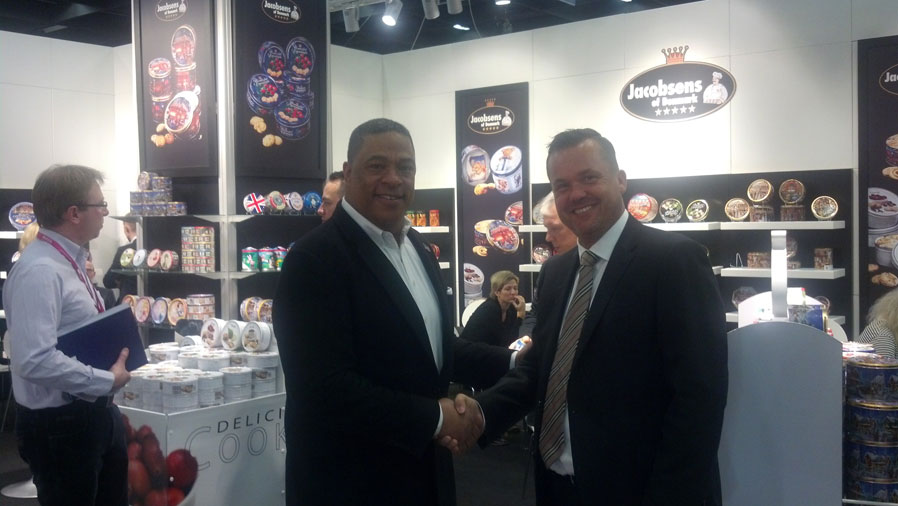 Emile Johnson President and CEO of Manufacturers Sales Solutions parent company of Goode Foods meets with Per Scharnberg Export Manger for Jacobsen's of Denmark at ISM, international food show in Cologne, Germany 1/25/2014
